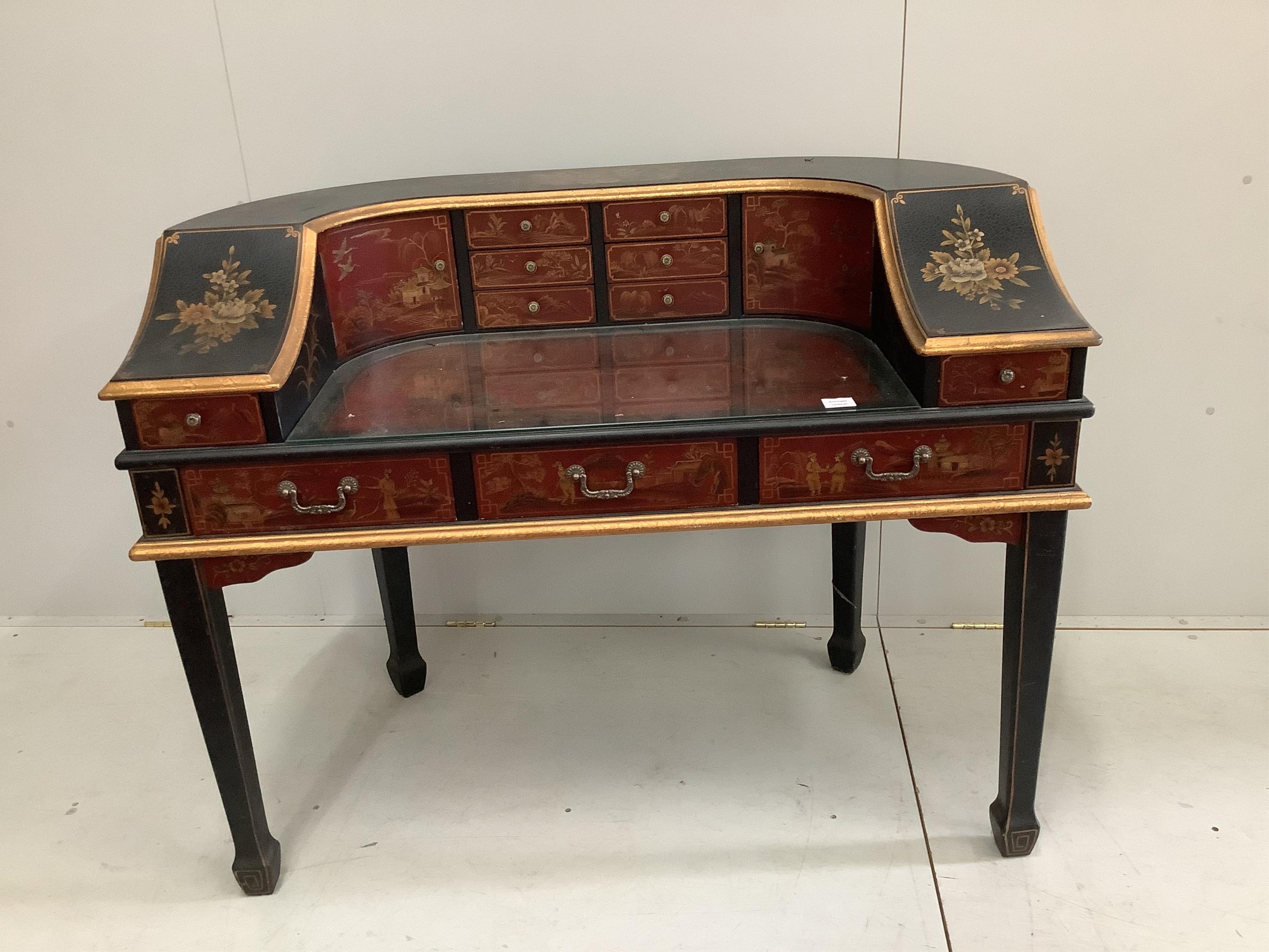 A reproduction chinoiserie painted Carlton House type desk, width 126cm, depth 64cm, height 89cm. Condition - fair